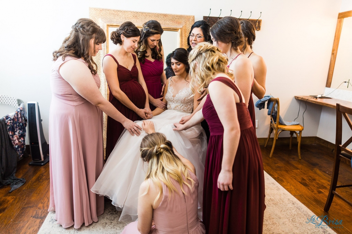 bridesmaids praying for bride stone crest