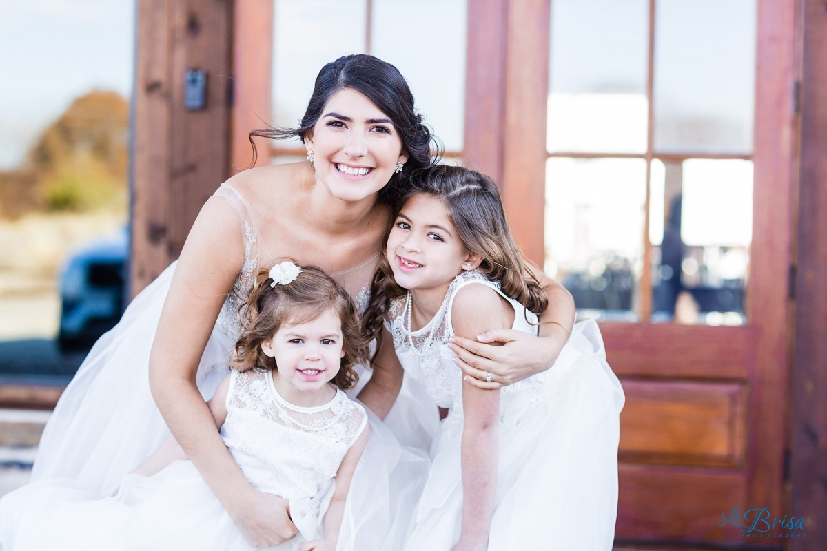 bride with flower girls stone crest