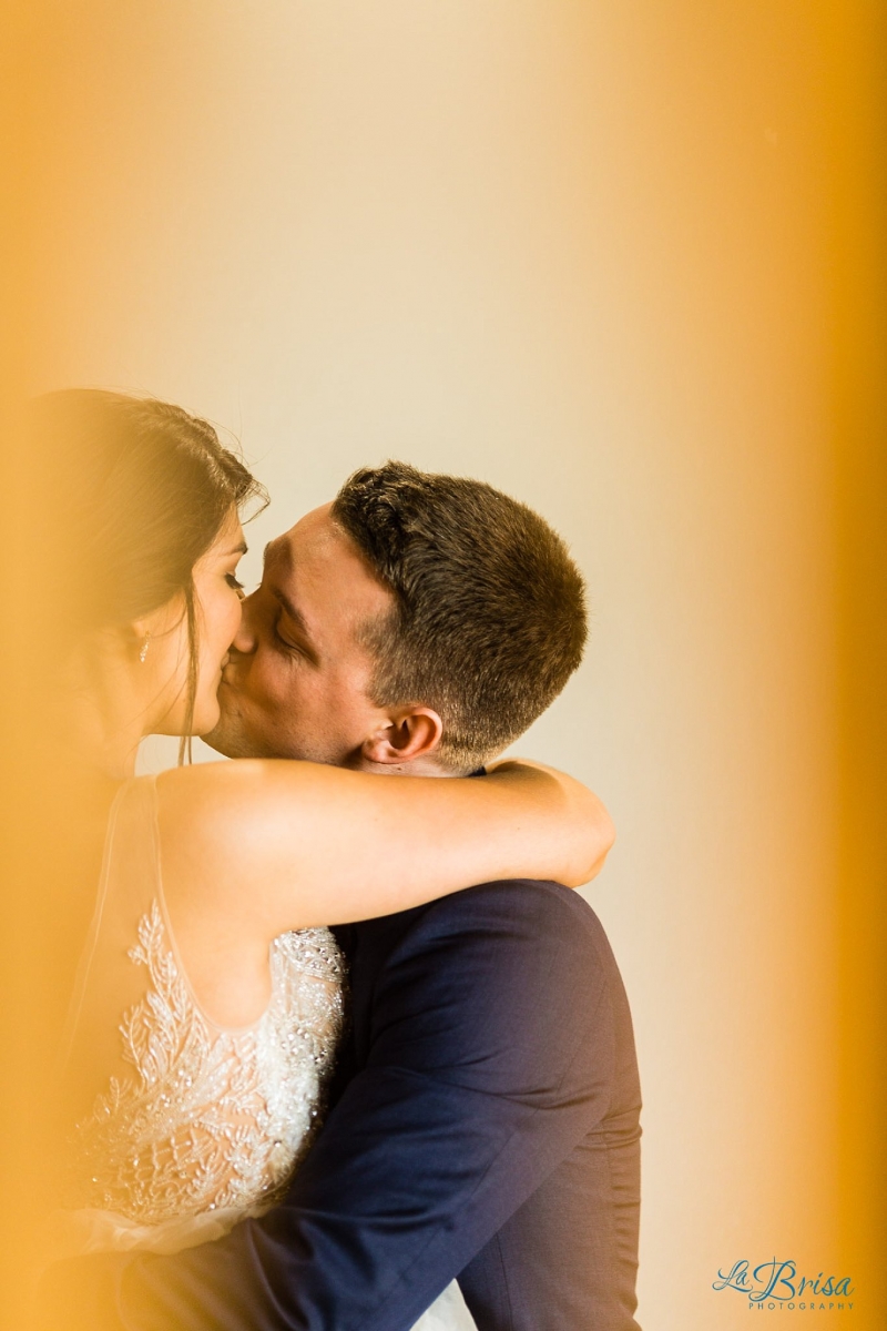 bride groom embrace after stone crest wedding ceremony