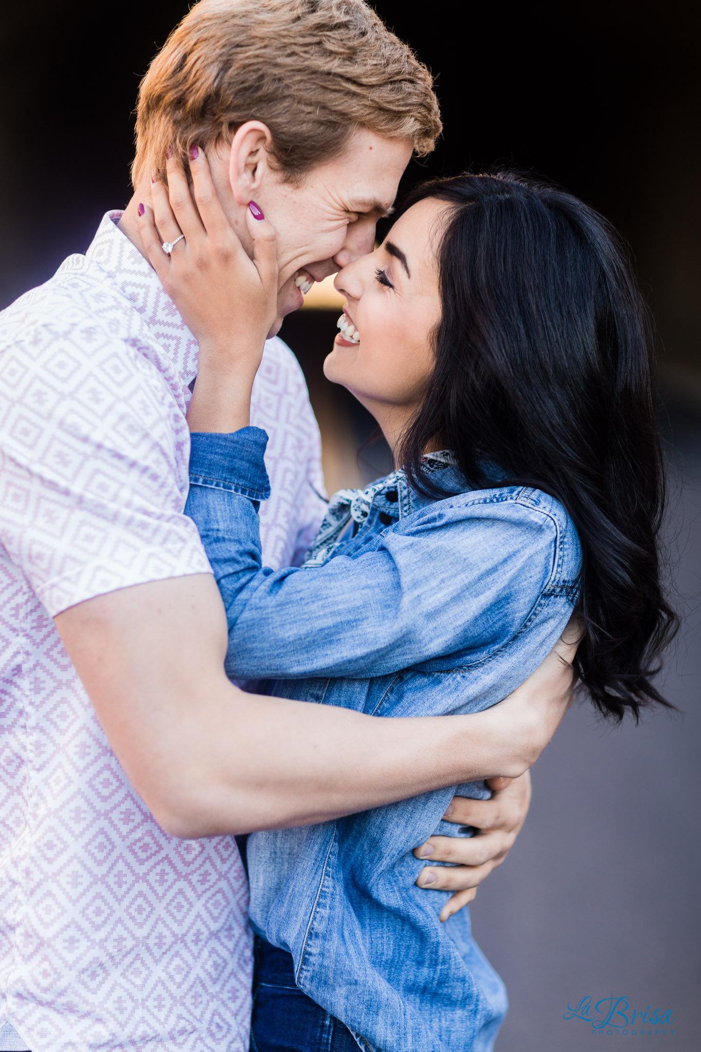 intimate joyful engagement pose