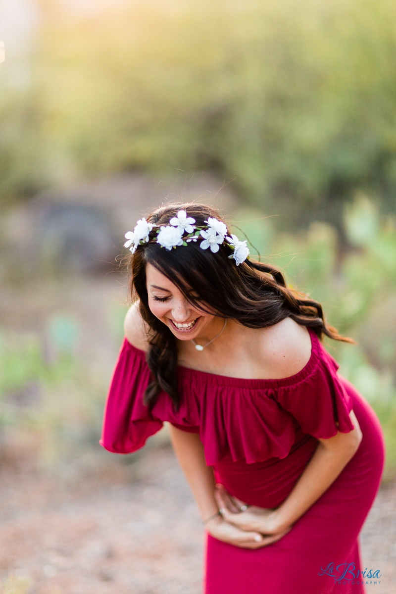 red maternity dress flower crown laughing