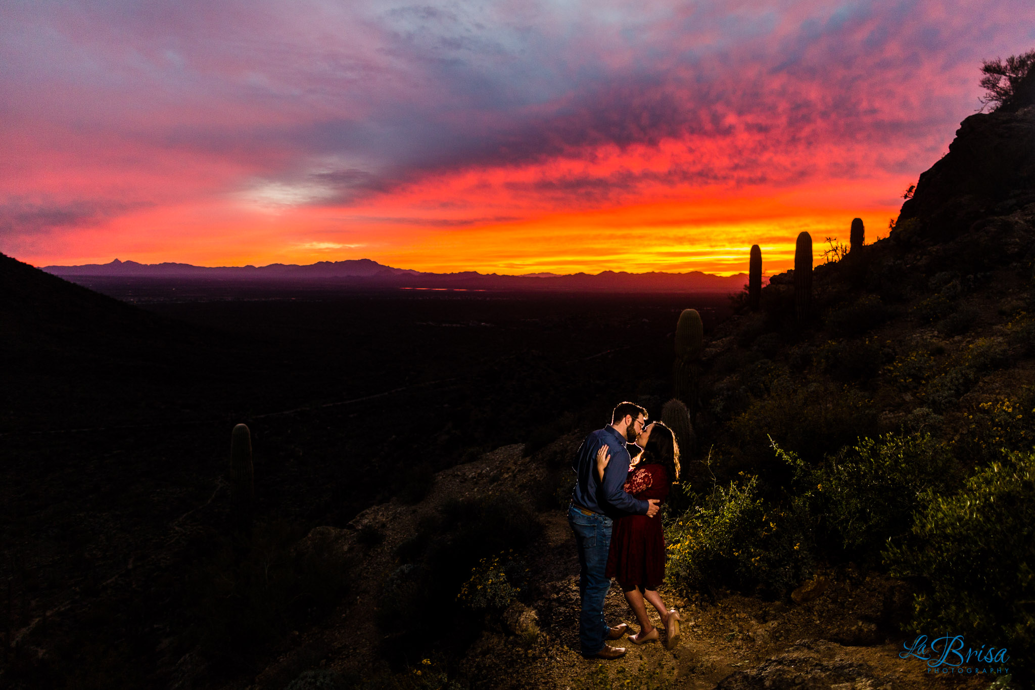 kiss and dip Gates Pass sunset Tucson engagement 