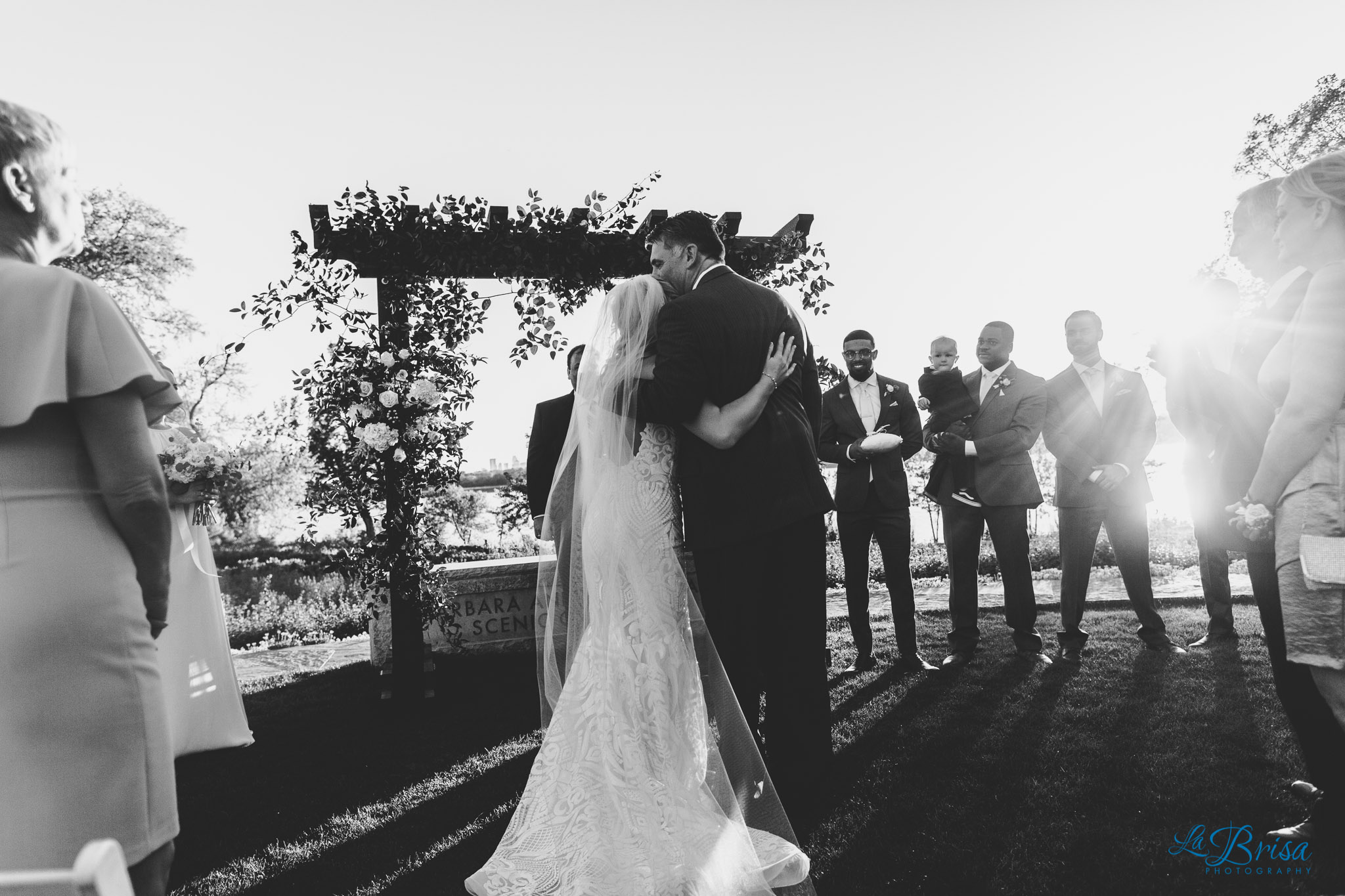 father kisses bride dallas arboretum and botanical gardens wedding ceremony