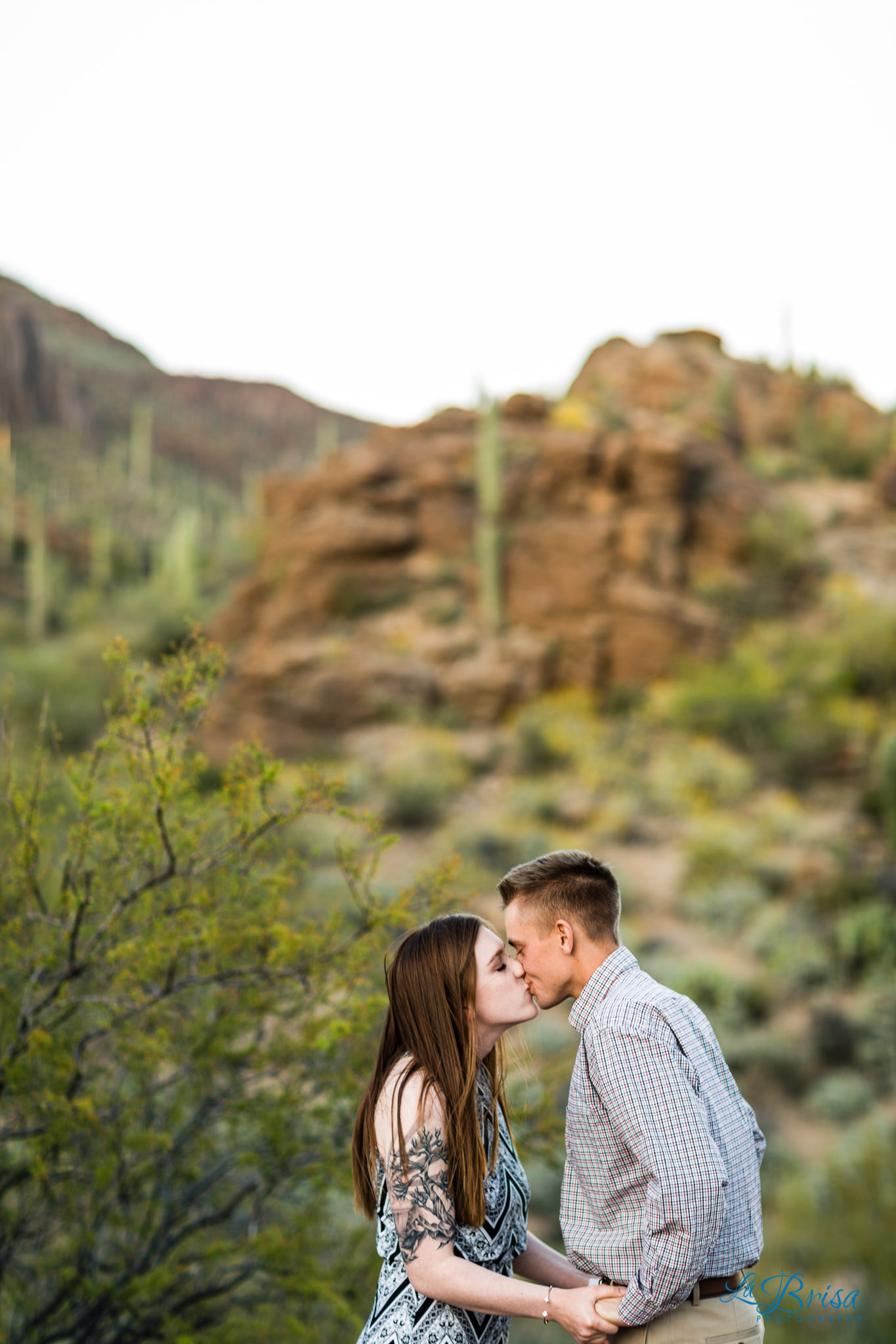 bride groom first kiss Gates Pass wedding ceremony