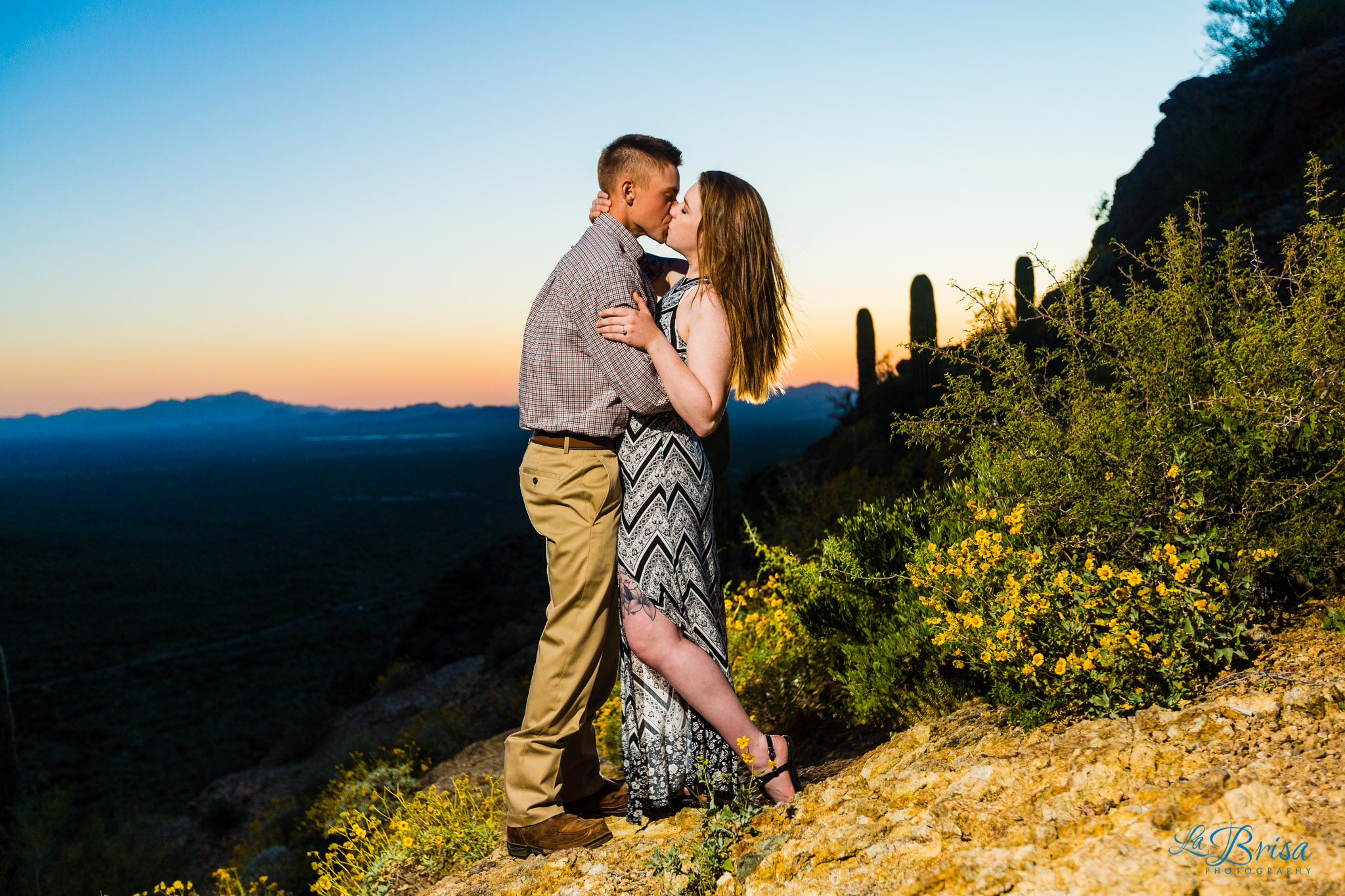 groom kissing dipping bride gates pass elopement