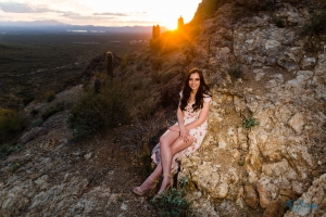 sitting high low dress gates pass sunset senior portrait pose